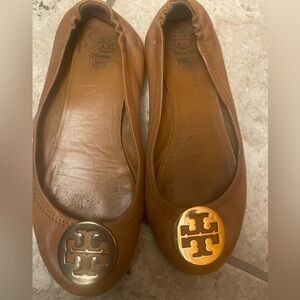 Well worn leather flats